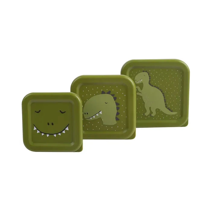 Set aus drei quadratischen Kindersnackboxen mit Dinosauriermotiven in verschiedenen Grüntönen, stapelbar und praktisch für unterwegs.